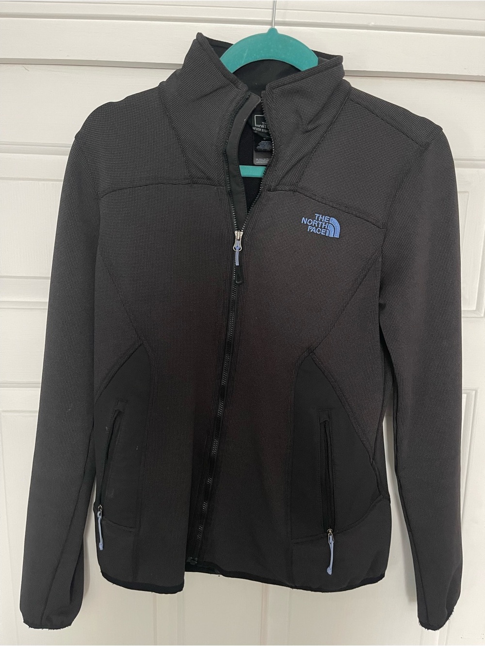 The North Face Black Jacket with Blue Logo